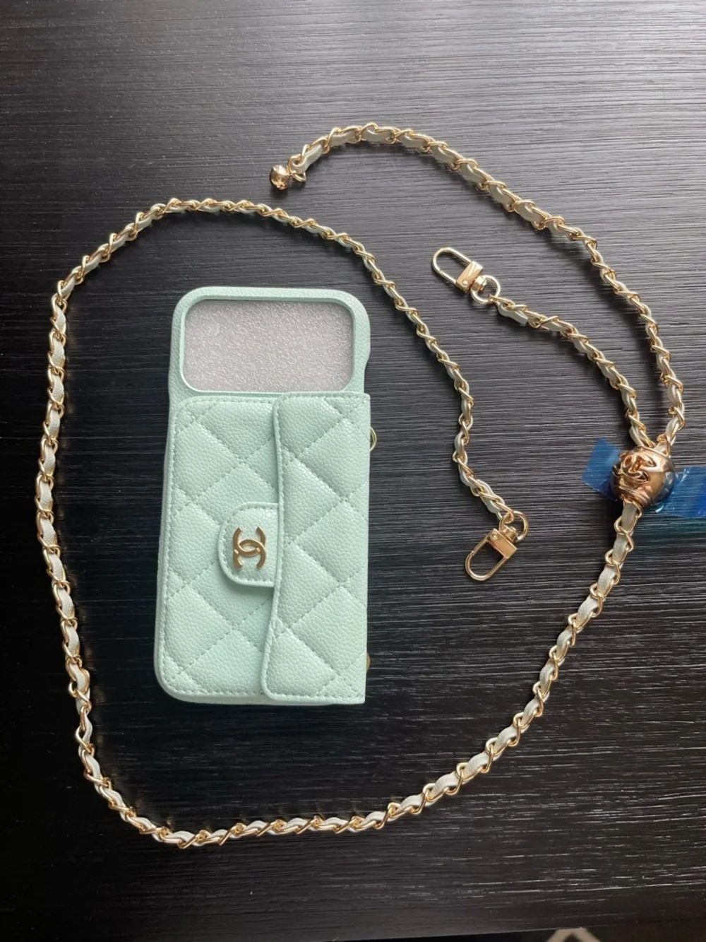 iPhone 17 Pro Max Quilted Teal Green Crossbody Phone Case with Gold Chain.